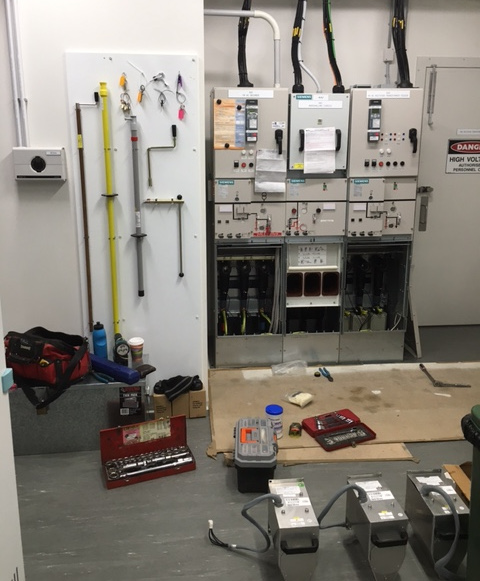 HV operator commissioning a new switchgear installation, providing isolation and earthing of high voltage circuit breakers and secondary circuits for the safe issue of Electrical Access Permits and Notice of Work on Apparatus